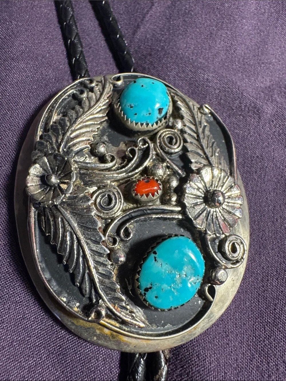 Turquoise Stone Western Bolo Tie - Silver Like Floral Accent